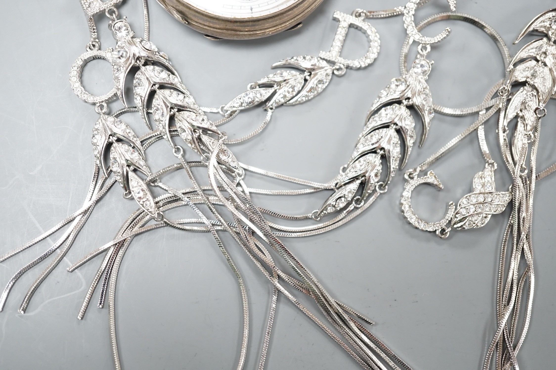 A Victorian silver open faced keywind pocket watch and a paste set suite of jewellery.